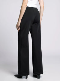 Back view of black wide-leg pants showing smooth fit and tailored design.