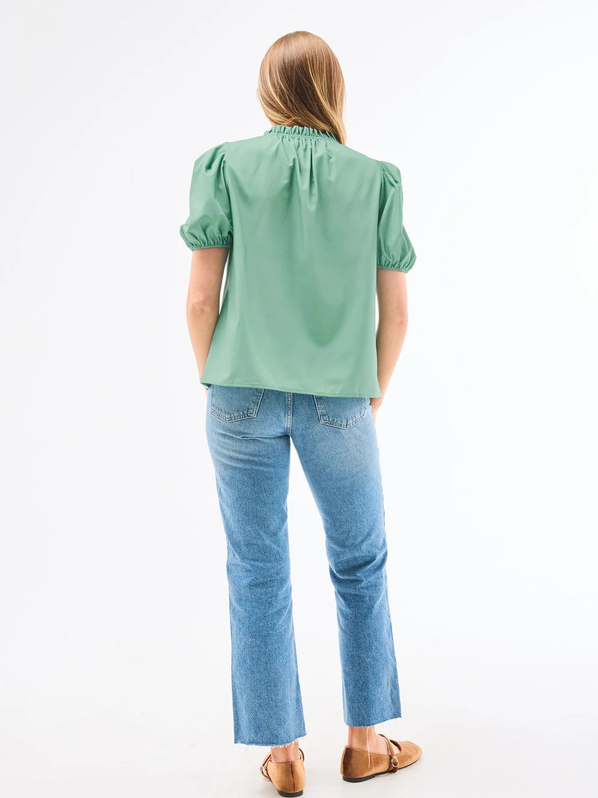 Back view of Mary Square Lainey Blouse in green — short puff sleeves and gathered neckline design.