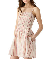 Woman wearing a pink striped dress on a white background