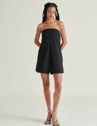 Steve Madden Morgana strapless romper in black with hidden pockets, built‑in shorts & back zip – available at ShopReverieCo.com