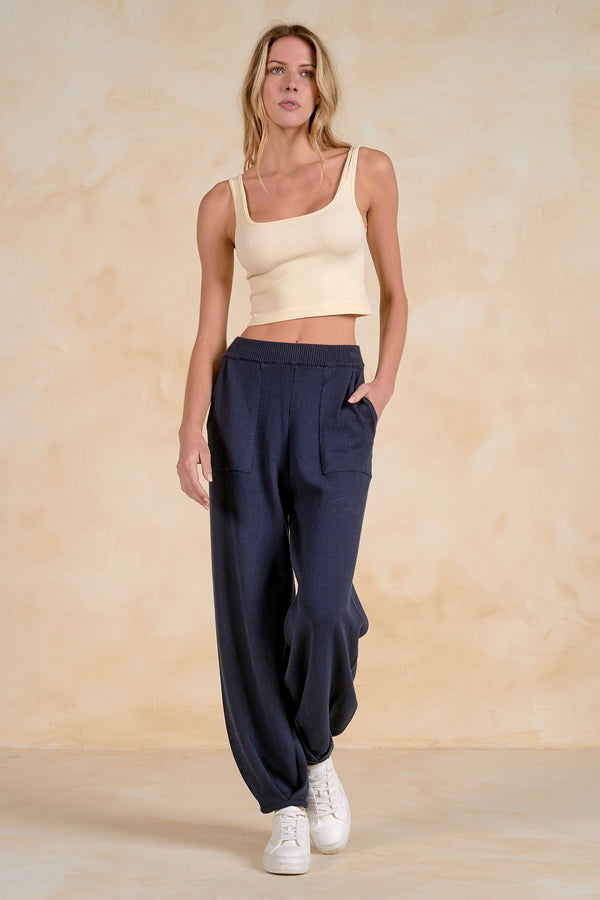 Women’s Blaine navy knit lounge pants styled with a cream tank and white sneakers