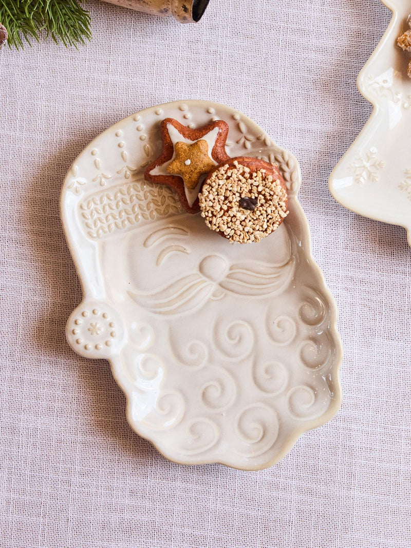 Embossed ceramic Santa plate with milk glaze finish and cookies for Christmas entertaining
