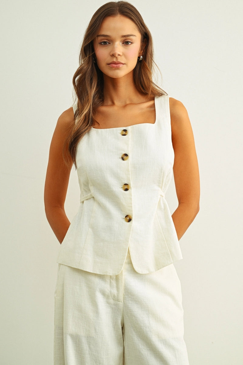 Cream linen button vest top for women with square neckline and tortoise shell buttons front view