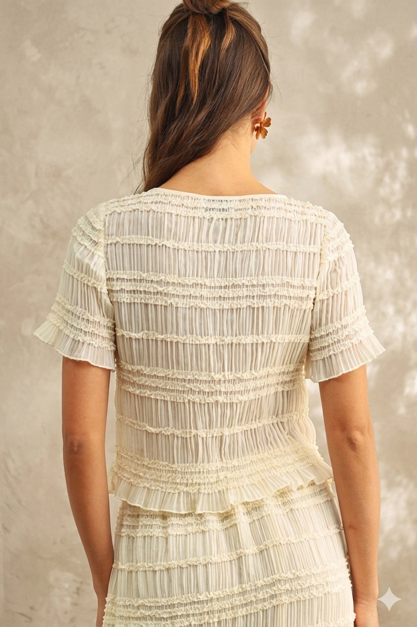 back view cream textured blouse women short sleeve ruffle detail