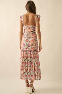Side profile of the floral mesh maxi dress highlighting the trend-forward drop-waist and ruched fabric texture.