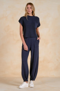 Elan SW11480 navy short sleeve sweater top with chest pocket styled with matching knit pants