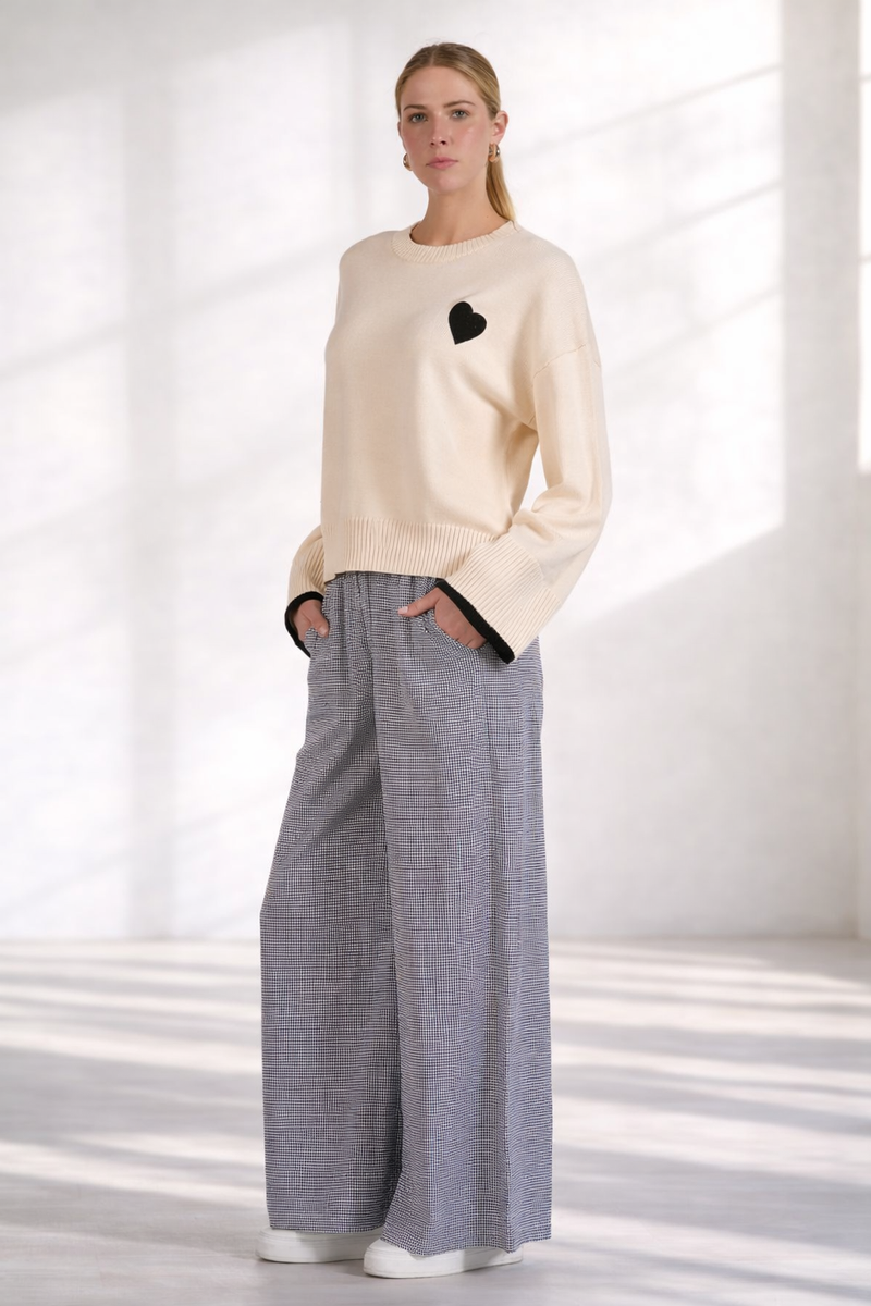 Side view of women's gingham wide leg pants with relaxed silhouette
