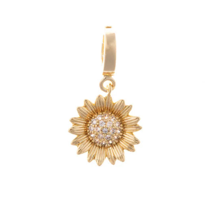 Close-up of the Michelle McDowell gold sunflower charm, embellished with sparkling pave crystals for flower lovers.