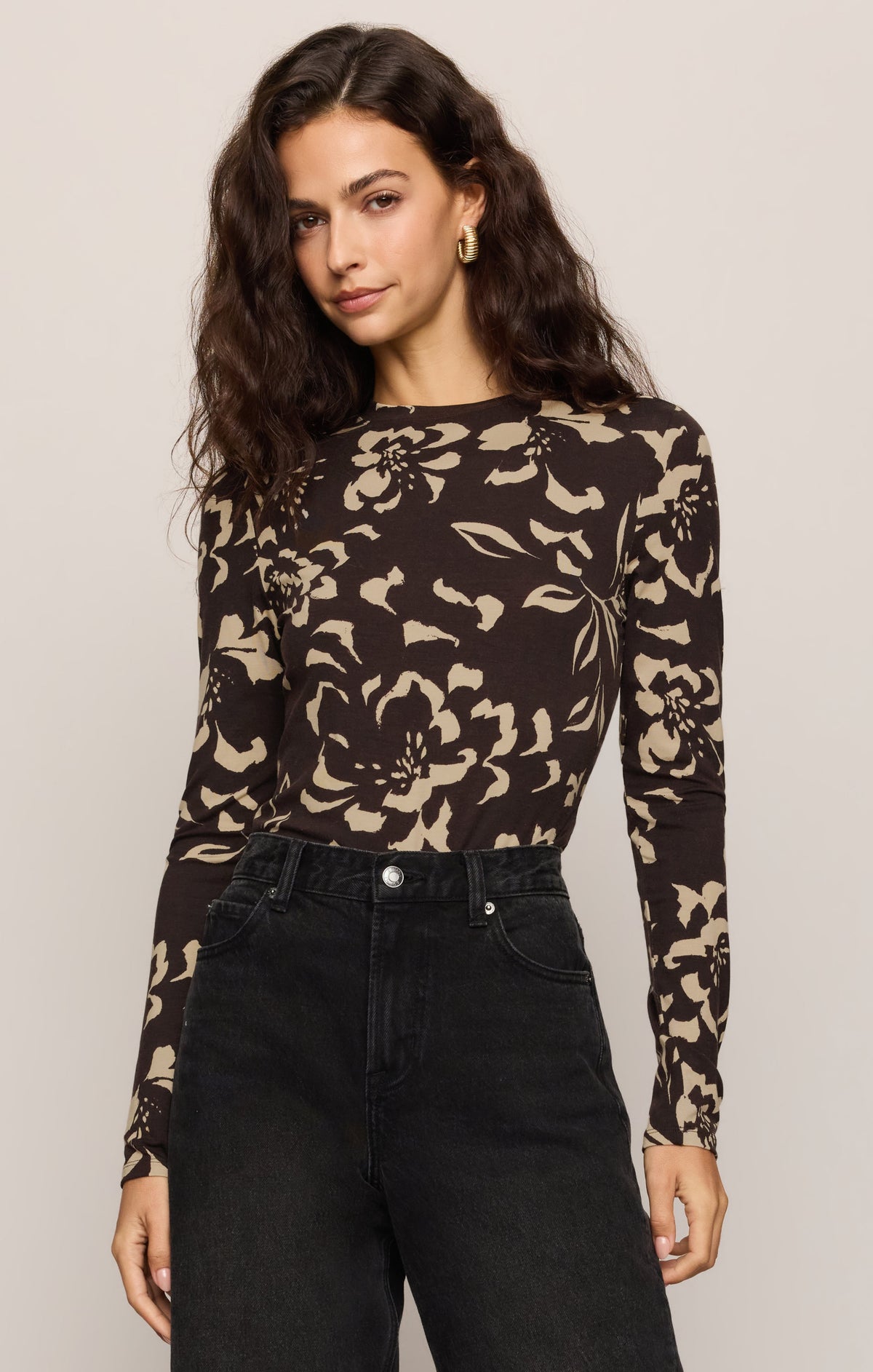 Front View of women in brown floral long sleeve top