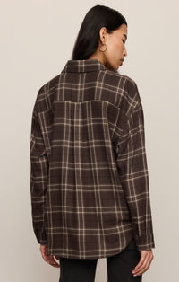 River Plaid Button Up in Dark Roast, back view showing the curved hem — women's soft plaid flannel shirt