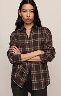 River Plaid Button Up in Dark Roast, front view with arms crossed showing the brown-and-cream plaid — women's flannel button up shirt