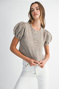 Model wearing Shanty Sweater styled with white denim for a chic boutique outfit.