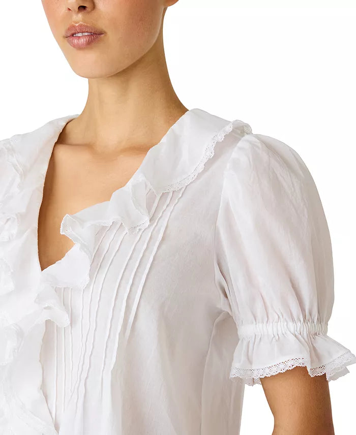 Close up of ruffle neckline and pintuck pleats on Steve Madden Lyric white blouse