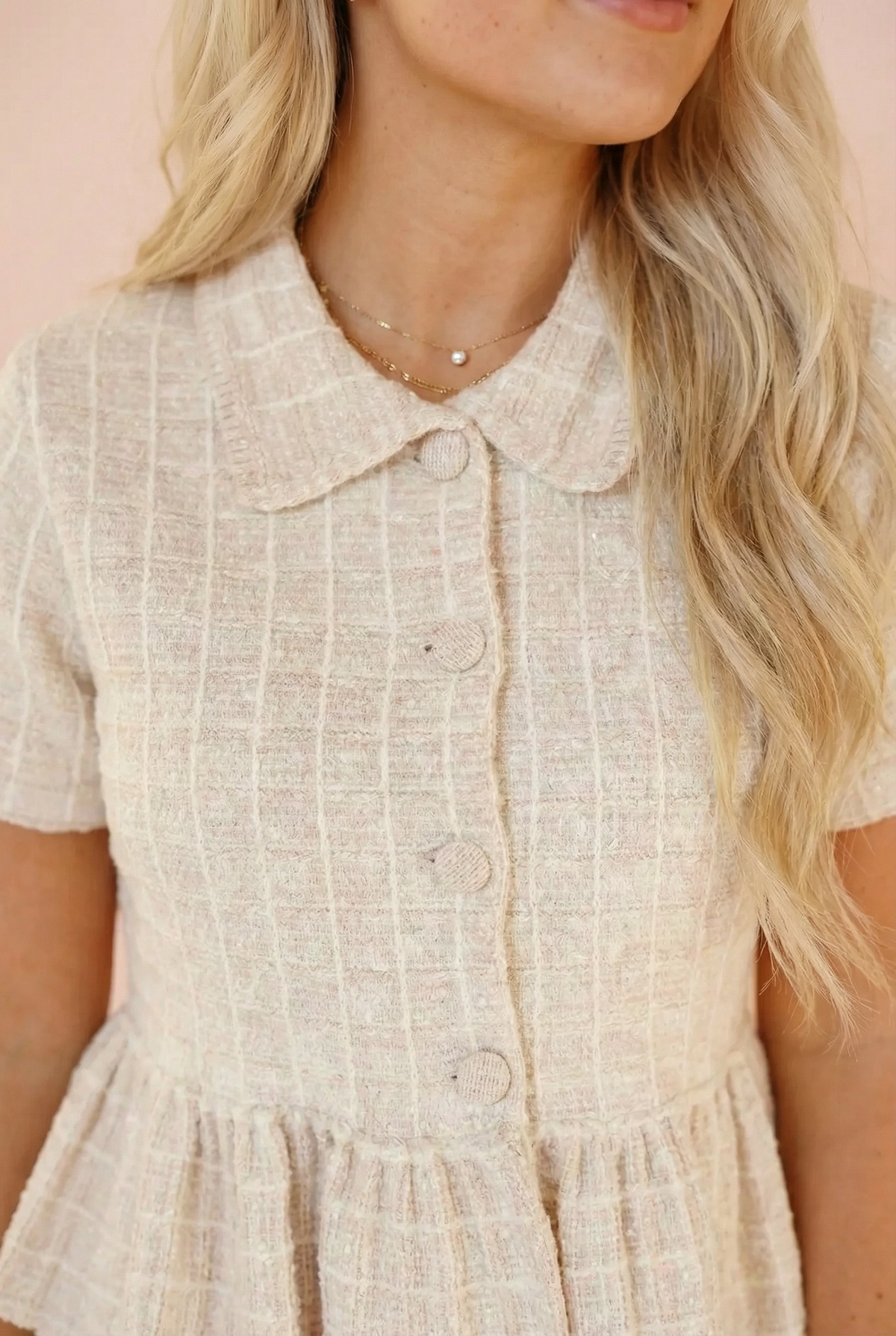 Close-up detail of the Steve Madden Roxanna top, showing the textured tweed-like fabric with subtle shimmer, spread collar, and tonal covered buttons.