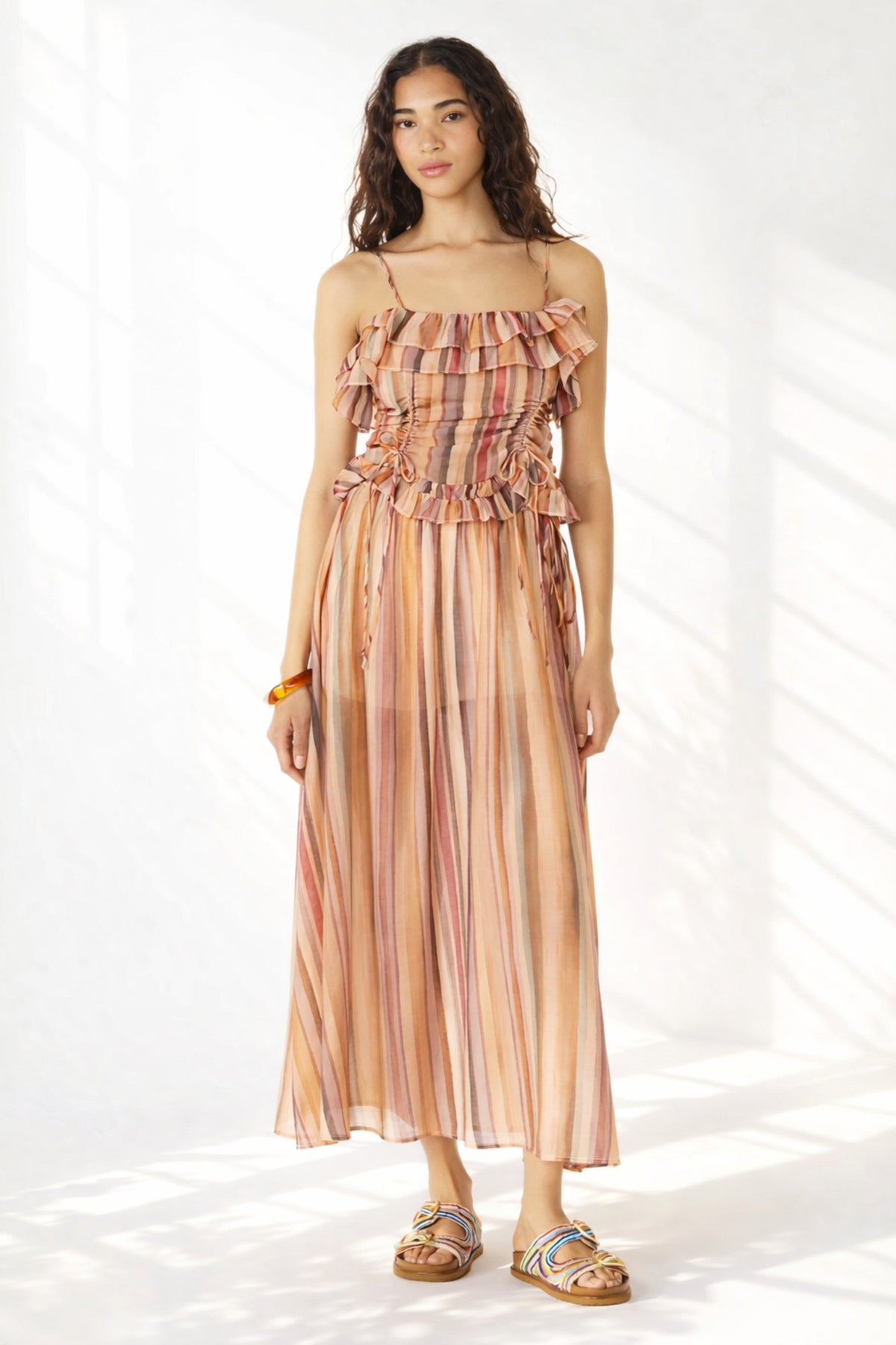 Model wearing Steve Madden Shilloh striped ruffle top styled for summer outfit