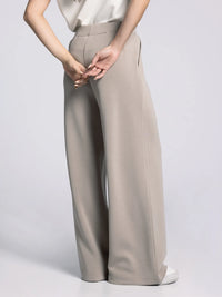 Back view of Thread & Supply Soft Trouser Pants — relaxed wide-leg style with smooth, high-rise waistband and clean tailoring.